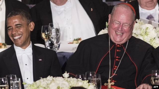 Președintele Barack Obama și cardinalul Timothy Dolan, arhiepiscop de New York, în 2012