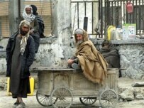 Afghan men waiting for work in Kabul (AFP)