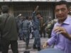 Police Beat Afghans At Crisis-Hit Bank