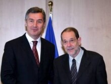 Belgium -- High Representative for the Common Foreign and Security Policy, Secretary-General of the Council Spanish Javier Solana (R) welcomes Milo Djukanovic, Prime Minister of Montenegro, in Brussels, 29May2006