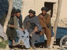 Afghanistan -- Afghan men in the town of Musa Qala in Helmand Province, shortly after the town was retaken by coalition troops, 15Dec2007