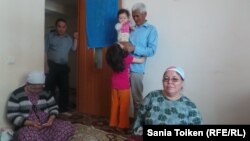 Қазақстанға көшіп келген оралман отбасы. (Көрнекі сурет)