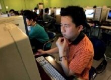 China - Using internet at an internet cafe in Beijing, 18 May 2006