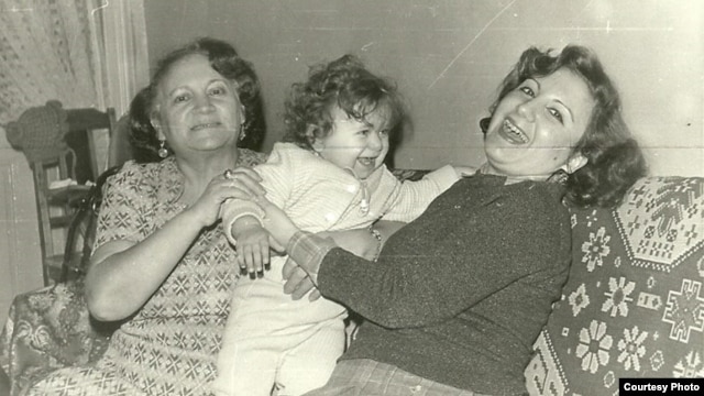 Leyla Yunus (right) with her mother and baby Dinara