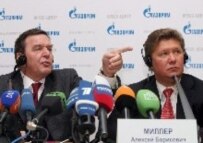 Schroeder (left) with the CEO of Russia's Gazprom, Aleksei Miller on March 30 (epa)