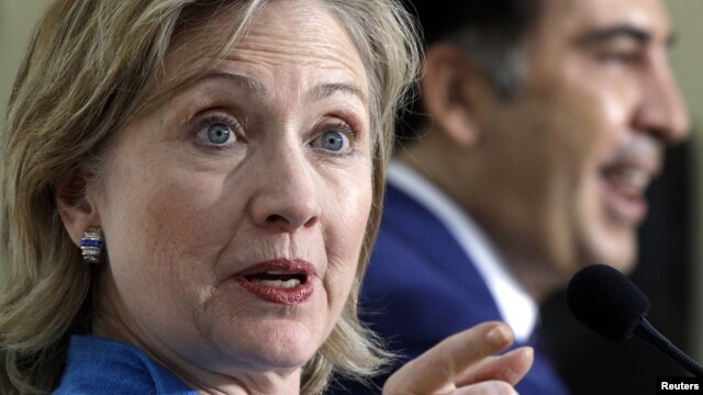 U.S. Secretary of State Hillary Clinton at a previous meeting with Georgian President Mikheil Saakashvili in Tbilisi