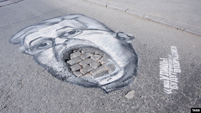 A pothole caricature of Yekaterinburg City Manager Aleksandr Yakob
