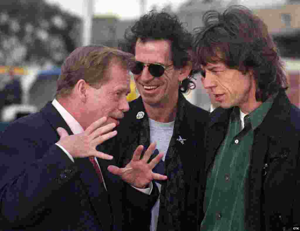 Czech President Vaclav Havel (left) talks with Richards and Jagger in 1995, the year the band presented Havel with a gift of new lighting in some of the grand halls in Prague Castle.