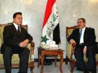 Zebari (right) told Babacan that Iraq won't let anyone, even the PKK, spoil ties with Turkey (epa)