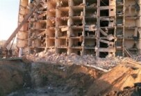 Khobar Towers blast scene in Dhahran, Saudi Arabia, in 1996 (AFP)