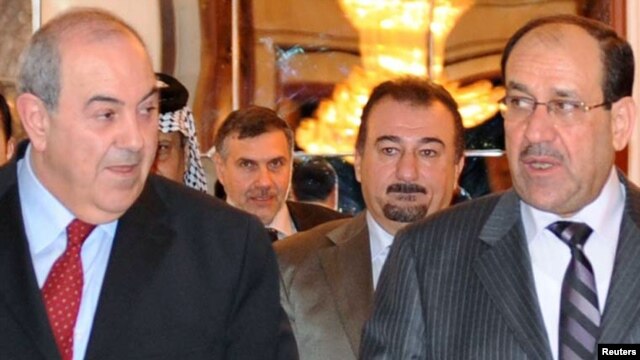 Former Prime Minister Nuri al-Maliki (right) with the head of Al-Iraqiyah, Iyad Allawi