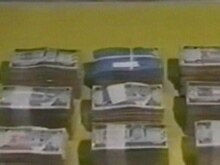 Saudi Arabia -  A video grab taken from Saudi news television station Al-Ekhbaria shows a cache of money seized by Saudi security forces following the arrest today of terror suspects, 27Apr2007
