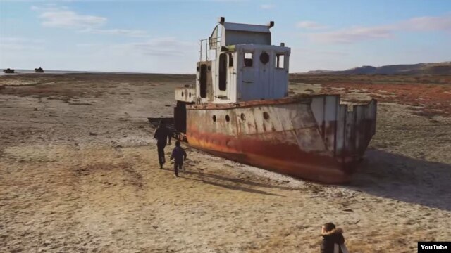 A grab from Pink Floyd's music video for the song "Louder Than Words," filmed near Aralsk and the Aral Sea in Kazakhstan.