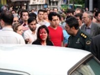 An Iranian woman purportedly bloodied by police over her 