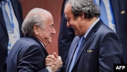 FIFA President Sepp Blatter (left) has slammed the UEFA head Michel Platini (right) over a corruption investigation into the workings of world soccer's governing body.