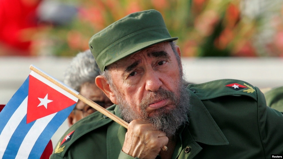 Cuban President Fidel Castro listens to a speaker during the May Day parade in Havana's Revolution Square in 2005.