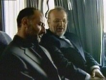 TV screen shot shows Jalal Sharafi (L), a top Iranian diplomat seized at gunpoint in Baghdad two months ago, with Foreign Minister Manuchehr Mottaki, upon his arrival in Tehran, 03Apr2007