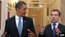 How much have Russians' opinions of the United States improved? Barack Obama and Dmitry Medvedev at the Kremlin in July 2009