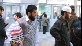 Tajik students pictured here returning from Islamic countries