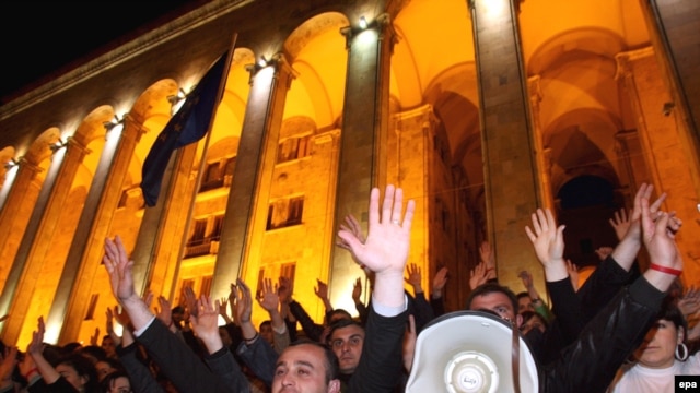Anti-Saakashvili protesters warmed up the crowd at an event at the same square on April 8, one day ahead of the planned nationwide protests.