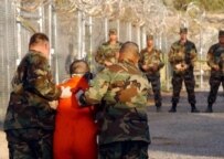 U.S. troops escort a detainee at Guantanmo Bay, Cuba (file photo) (epa)