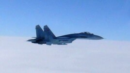 Japan --  Aeroplani ushtarak rus SU-27 në hapësirën ajrore të Japonisë 07 shkurt 2013
