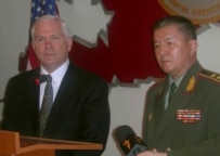 Gates (left) with Kyrgyz Defense Minister Isakov today in Bishkek