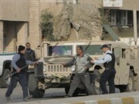 Iraqi police on patrol in Baghdad in December 2006 (epa)