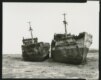 Rusted-out hulls from an abandoned Aral Sea fleet. The "Aleksei Leonov" and her sister ship in the windswept basin of the former Dzambul Harbor
