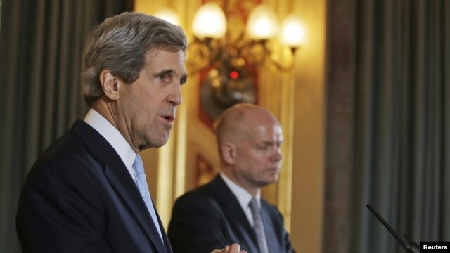 U.S. Secretary of State John Kerry (left) and British Foreign Secretary William Hague hold a joint news conference in central London on February 25.