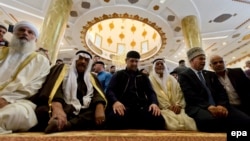 Chechen leader Ramzan Kadyrov (center) attends morning prayers at the Abu Ghosh mosque in Israel in 2013.