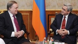 Armenia - President Serzh Sarkisian (R) meets with PACE co-rapporteur John Prescott, 17Jan2012.