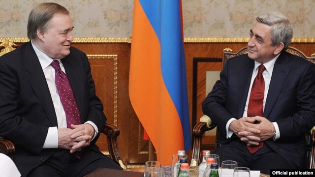 Armenia - President Serzh Sarkisian (R) meets with PACE co-rapporteur John Prescott, 17Jan2012.