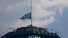 The Kazakh flag was at half-mast atop the national museum and other official buildings on June 5 to honor the dead border troops and ranger.