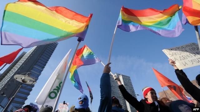 Gay rights activists take part in a rally against laws restricting the rights of homosexuals in downtown Moscow on March 10.