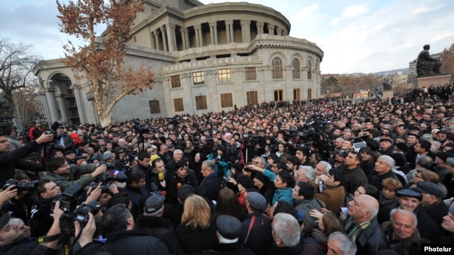 Supporters of Armenian opposition presidential candidate Raffi Hovannisian attend a rally in Yerevan's Liberty Square on February 19. 