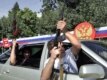 South Ossetian men celebrate the recognition of South Ossetia in Tskhinvali