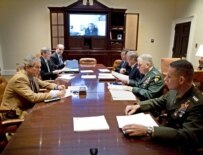 President Bush (left) and senior advisers discussing Iraq in Washington on October 21 (epa)