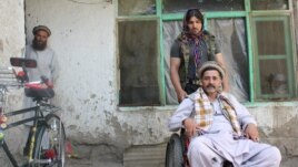 Occupants of the Union for Afghanistan's Disabled shelter pool what they earn doing odd jobs.