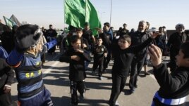 Pamje nga ritualet fetare të shiitëve në Irak