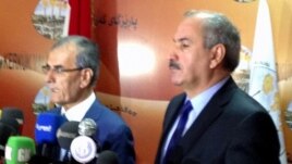 نائب رئيس حكومة إقليم كردستان العراق عماد أمد (يمين) مع محافظ كركوك نجم الدين كريم