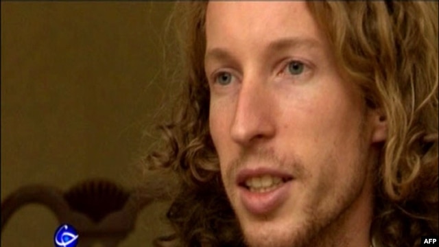 Iranian TV shows a long-haired man of European appearance in his 30s identified as Slovak Matej Valuch on January 16.