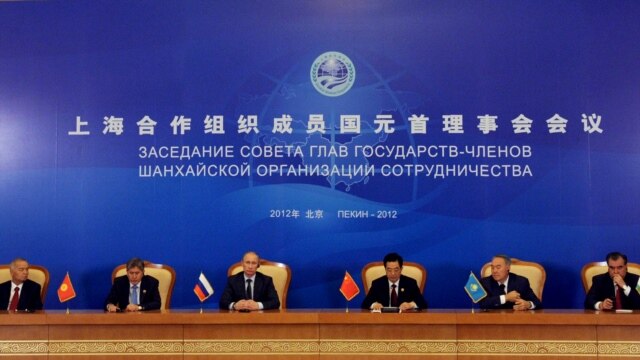 A signing ceremony during the Shanghai Cooperation Organization summit in the Great Hall of the People in Beijing on June 7, when the two-day gathering was concluding.