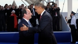Франция президенті Франсуа Олланд (сол жақта) пен АҚШ президенті Барак Обама. Франция, 6 маусым 2014 жыл.