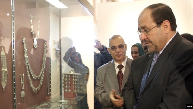Prime Minister Nuri al-Maliki inspects antiquities during the reopening ceremony of the National Museum in Baghdad in February 2009.