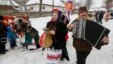 People dressed in traditional costumes sing Christmas carols during celebrations of Orthodox Christmas in the village of Pyrohovo near Kyiv, on January 7.
