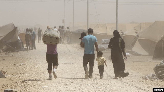 Syrian refugees arrive at the Al Zaatri refugee camp in the Jordanian city of Mafraq late last month. 