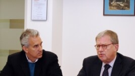 Michael Barone (right) and RFE/RL president Jeffrey Gedmin at RFE/RL's Washington office