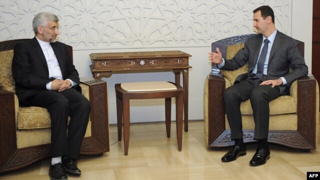 President Assad meets with Iranian envoy Saeed Jalili