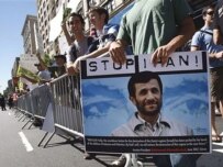 People demonstrating against Ahmadinejad outside Columbia University in New York (AFP)